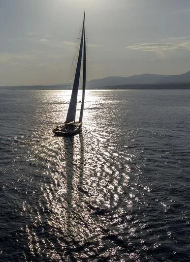 a sailboat on the water aboard NILAYA Yacht for Sale