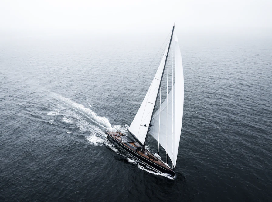 a boat sailing on the sea aboard NILAYA Yacht for Sale