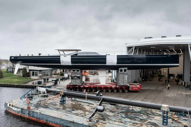 a large building with a crane aboard NILAYA Yacht for Sale