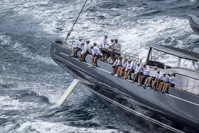 a group of people on a boat aboard NILAYA Yacht for Sale
