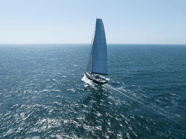 a sailboat in the ocean aboard NILAYA Yacht for Sale