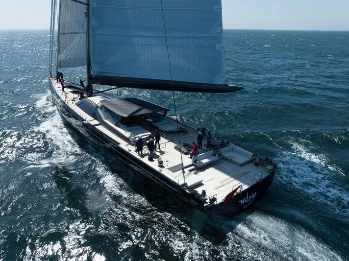 a boat sailing on the sea aboard NILAYA Yacht for Sale