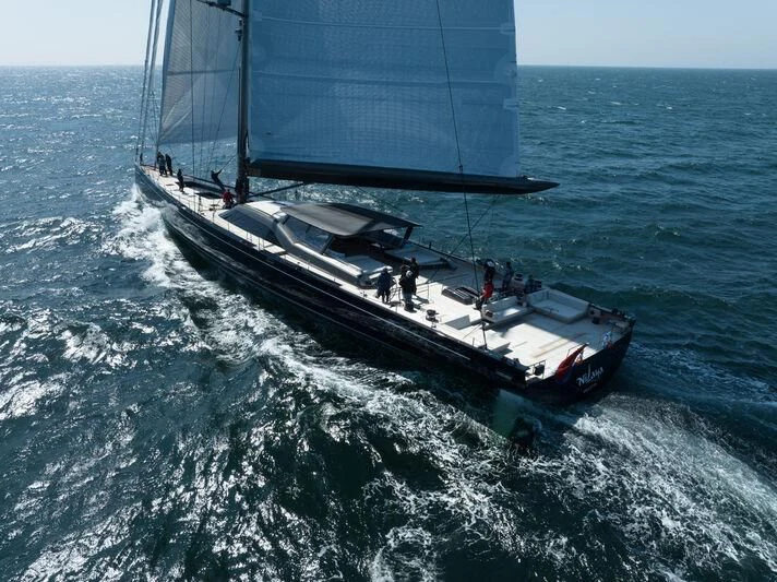 a boat sailing on the sea aboard NILAYA Yacht for Sale