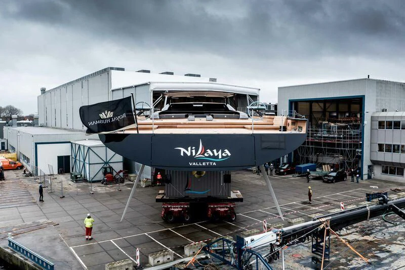 a large building with a large boat on top aboard NILAYA Yacht for Sale