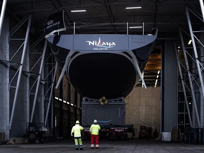 a few men in a factory aboard NILAYA Yacht for Sale