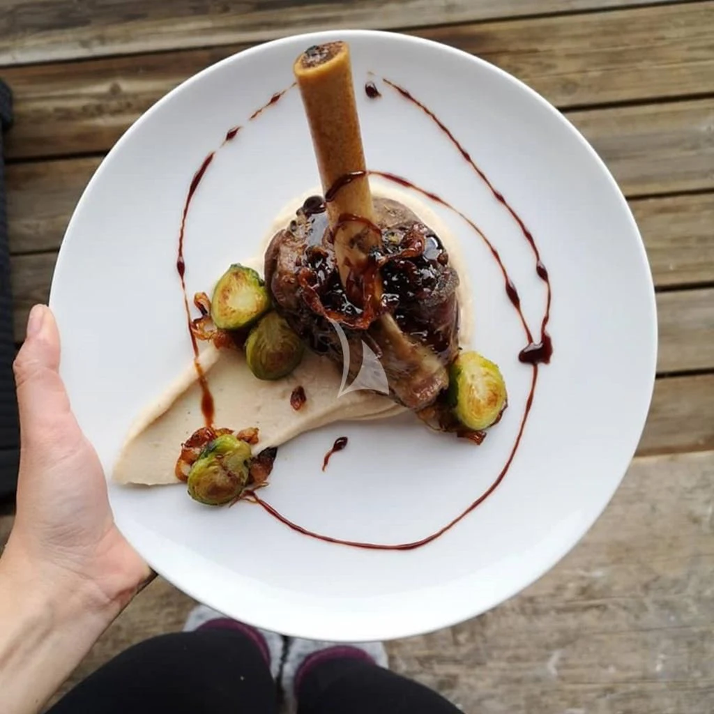 a plate of food aboard IROCK Yacht for Sale