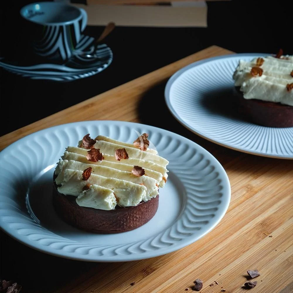 a couple of plates of desserts aboard IROCK Yacht for Sale
