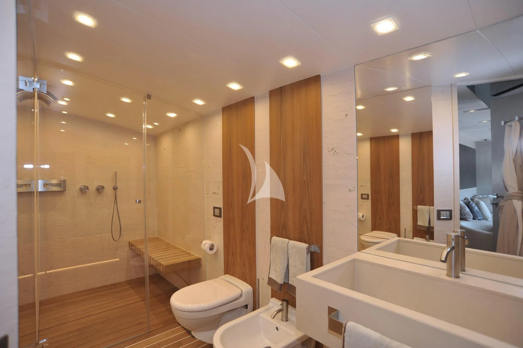 a bathroom with a large mirror aboard IROCK Yacht for Sale