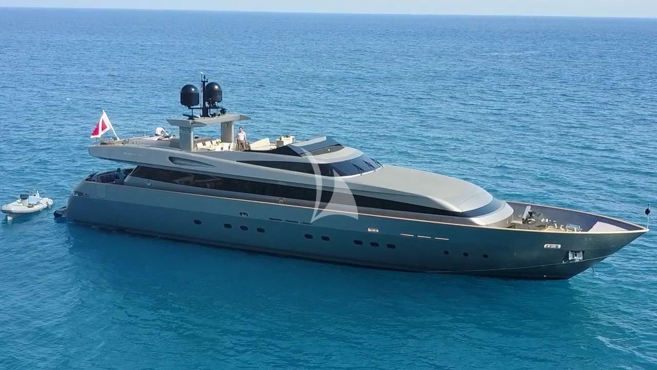 a large white yacht in the ocean aboard IROCK Yacht for Sale