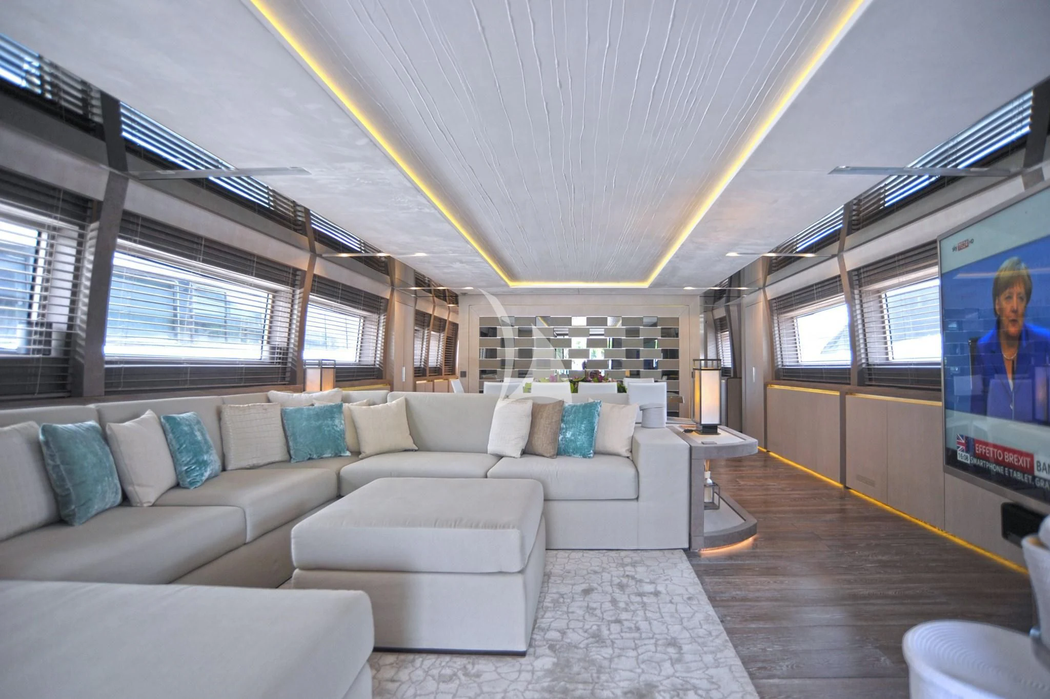 a living room with a large window aboard IROCK Yacht for Sale