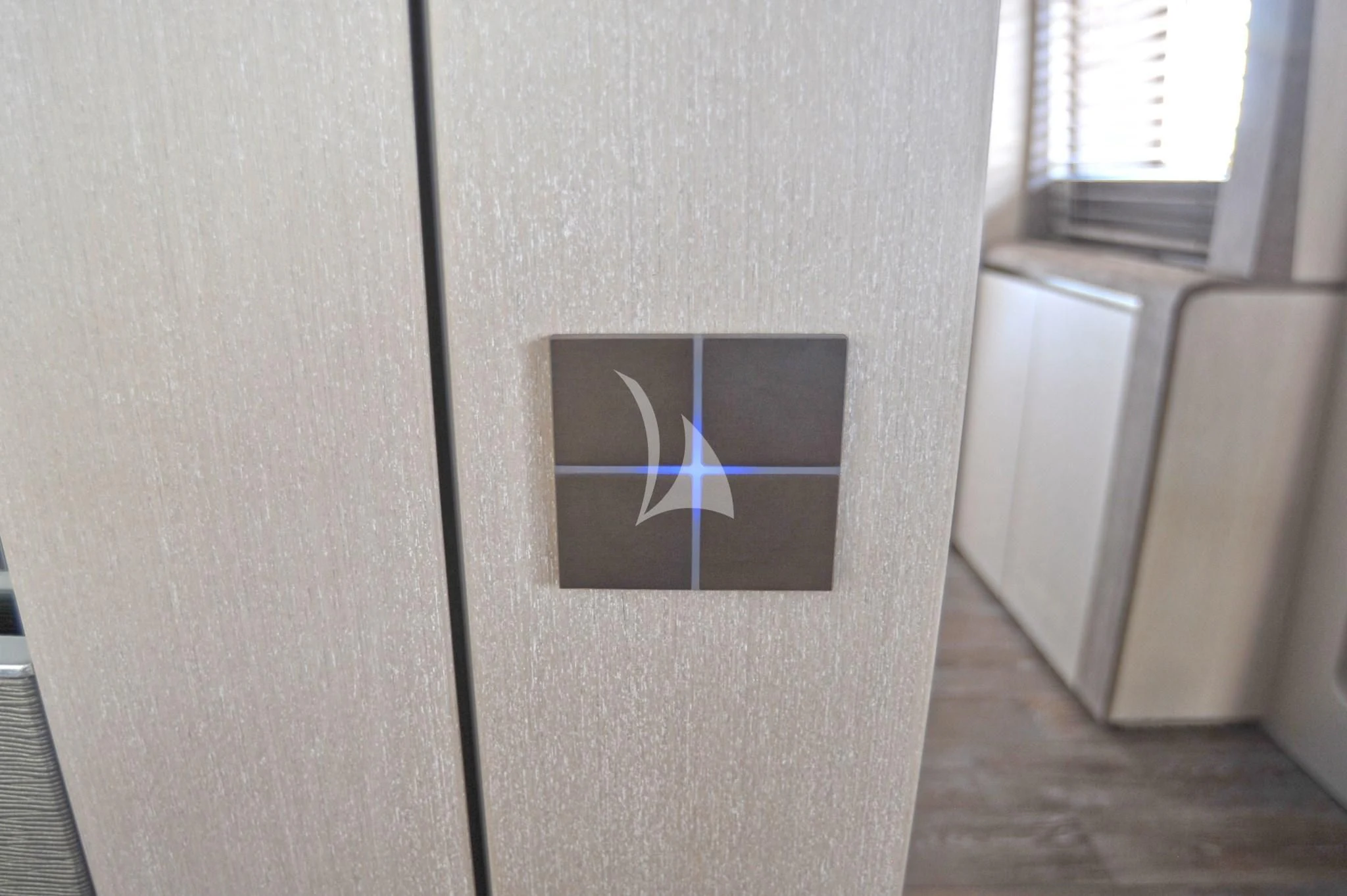 a rectangular object with a logo on it aboard IROCK Yacht for Sale