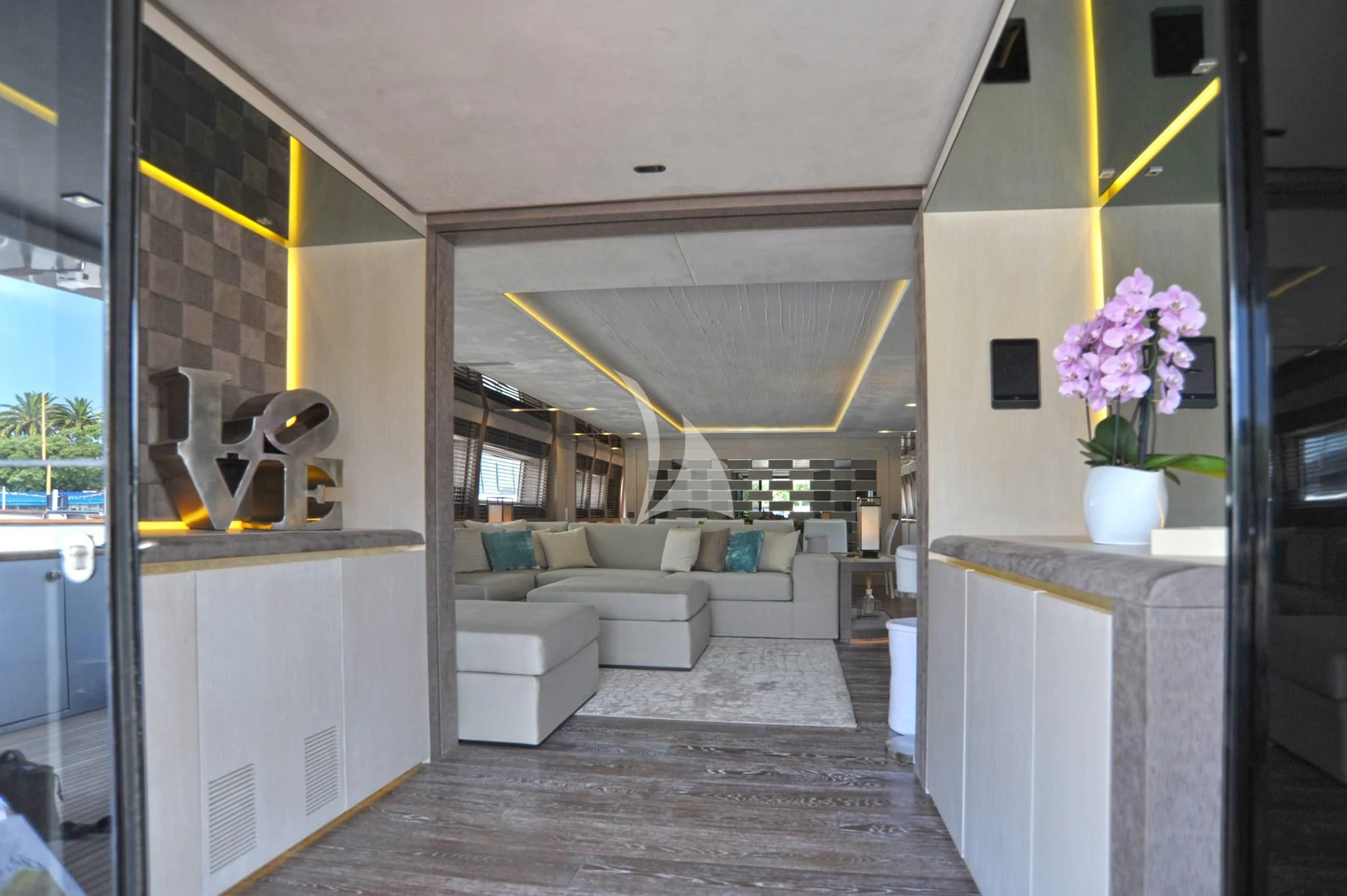 a room with a couch and a table aboard IROCK Yacht for Sale