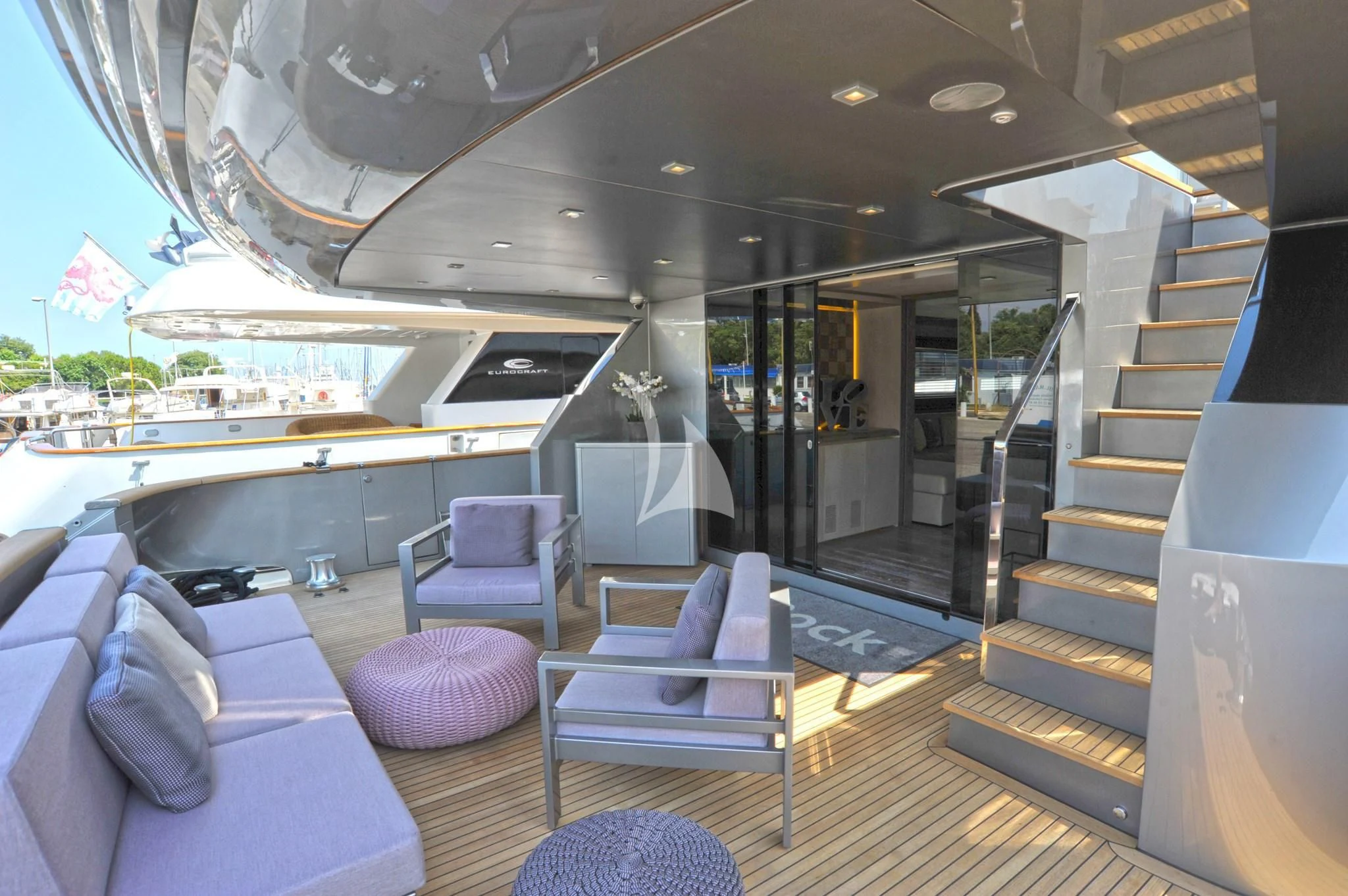 a modern looking living room aboard IROCK Yacht for Sale