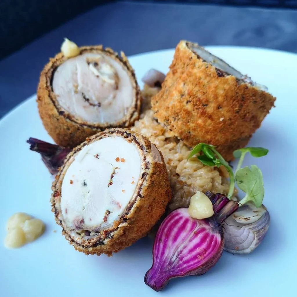 a plate of food aboard IROCK Yacht for Sale