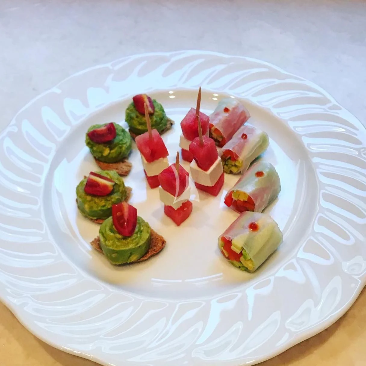 a plate of sushi aboard IROCK Yacht for Sale