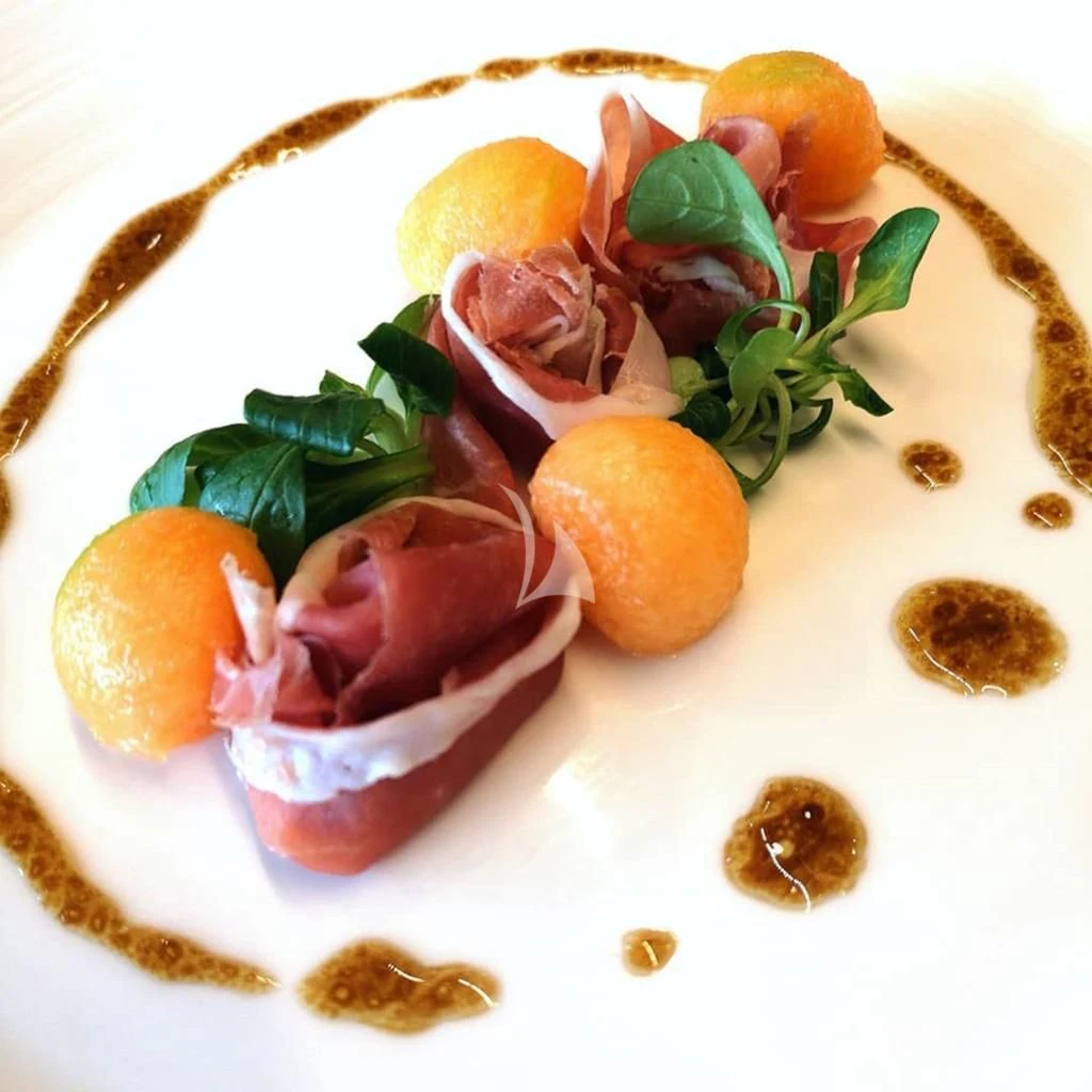 a plate of food aboard IROCK Yacht for Sale