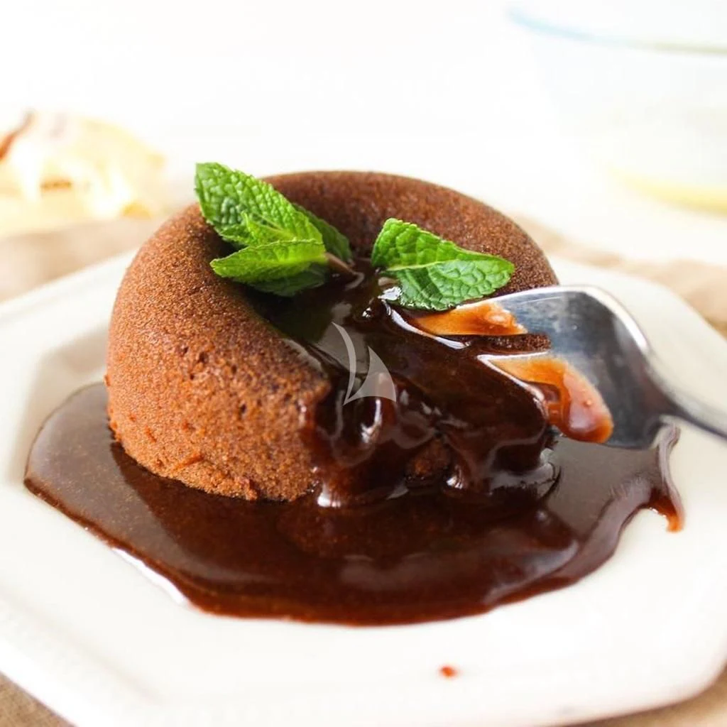 a chocolate dessert with a spoon aboard IROCK Yacht for Sale