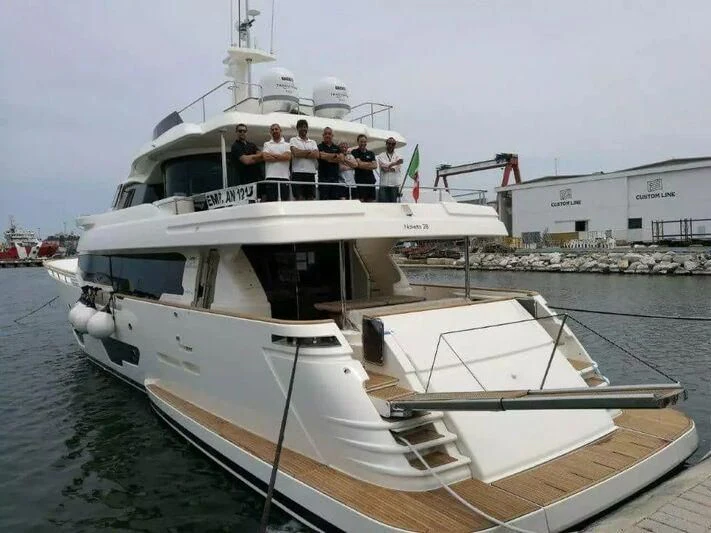 a group of people on a boat aboard MERIDIANA Yacht for Sale
