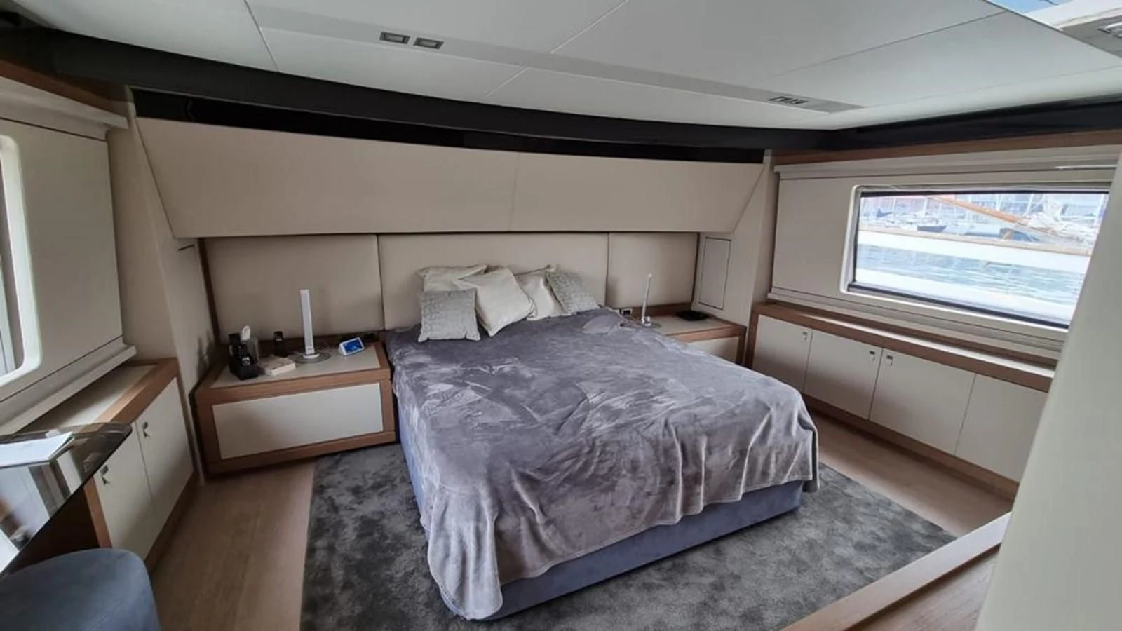 a bed in a room aboard MERIDIANA Yacht for Sale