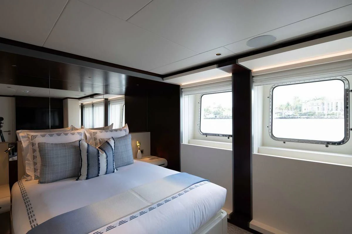 a bed in a room aboard INFINITY Yacht for Sale