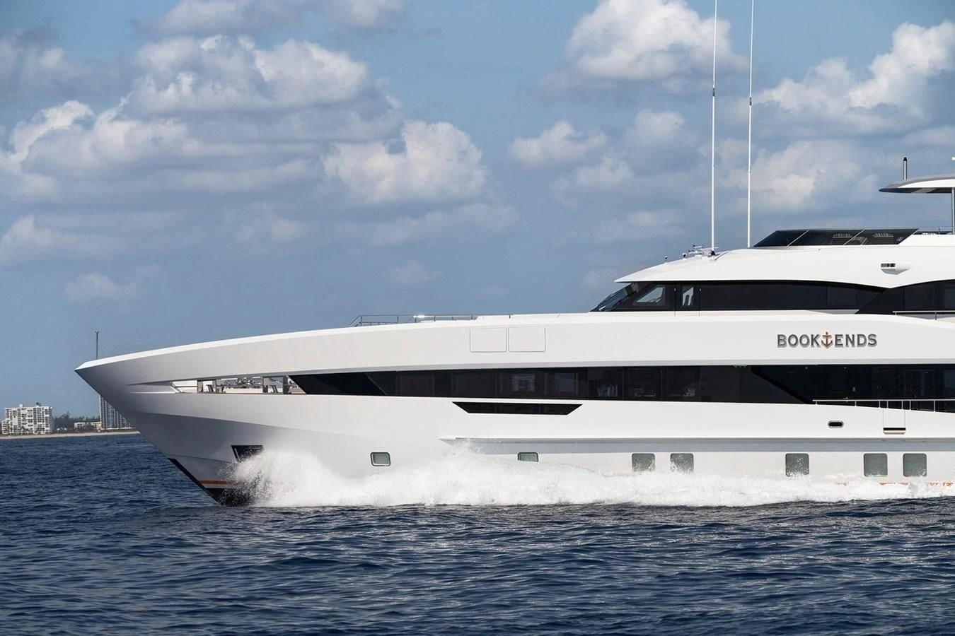 a white yacht in the water aboard INFINITY Yacht for Sale
