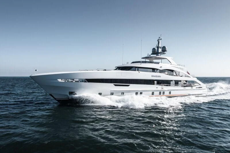 a white yacht on the water aboard INFINITY Yacht for Sale