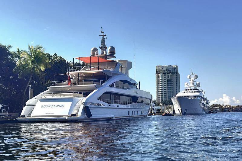 a couple of boats in the water aboard INFINITY Yacht for Sale