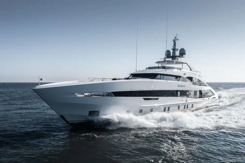 a white yacht on the water aboard INFINITY Yacht for Sale