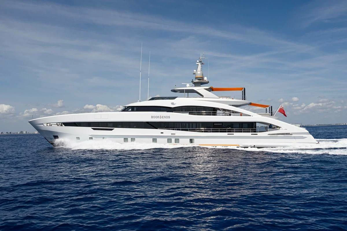 a white yacht in the water aboard INFINITY Yacht for Sale