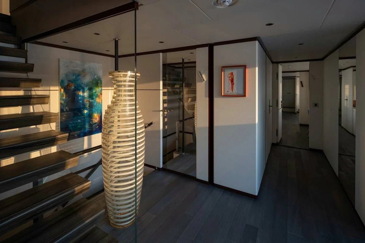a room with a large glass wall aboard INFINITY Yacht for Sale