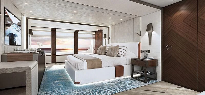 a bedroom with a bed and a desk aboard INFINITY Yacht for Sale