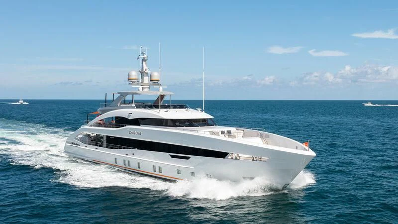 a white boat on the water aboard INFINITY Yacht for Sale