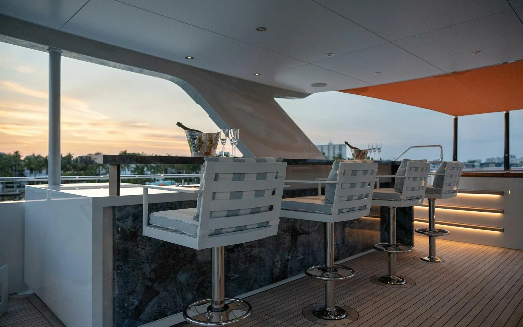 a cat sitting on a chair aboard INFINITY Yacht for Sale