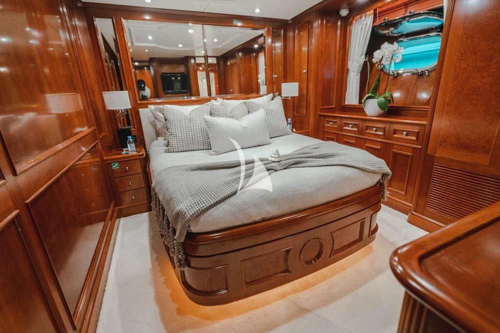 a bed in a room aboard HEAVEN CAN WAIT Yacht for Charter