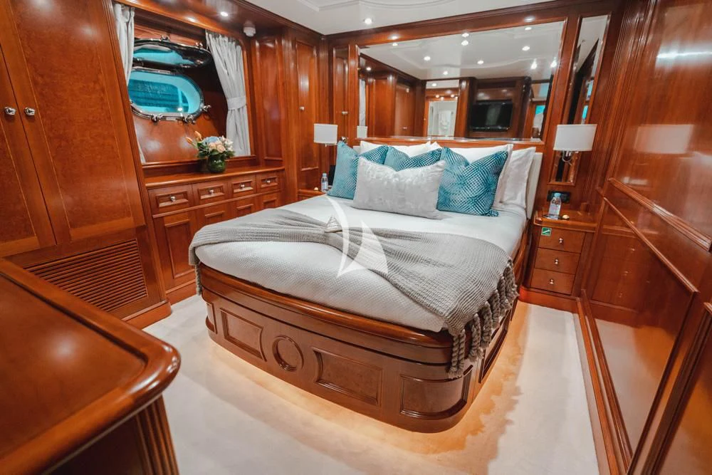 a bed in a room aboard HEAVEN CAN WAIT Yacht for Charter