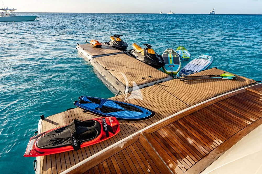 a boat with a paddle on the front aboard HEAVEN CAN WAIT Yacht for Charter