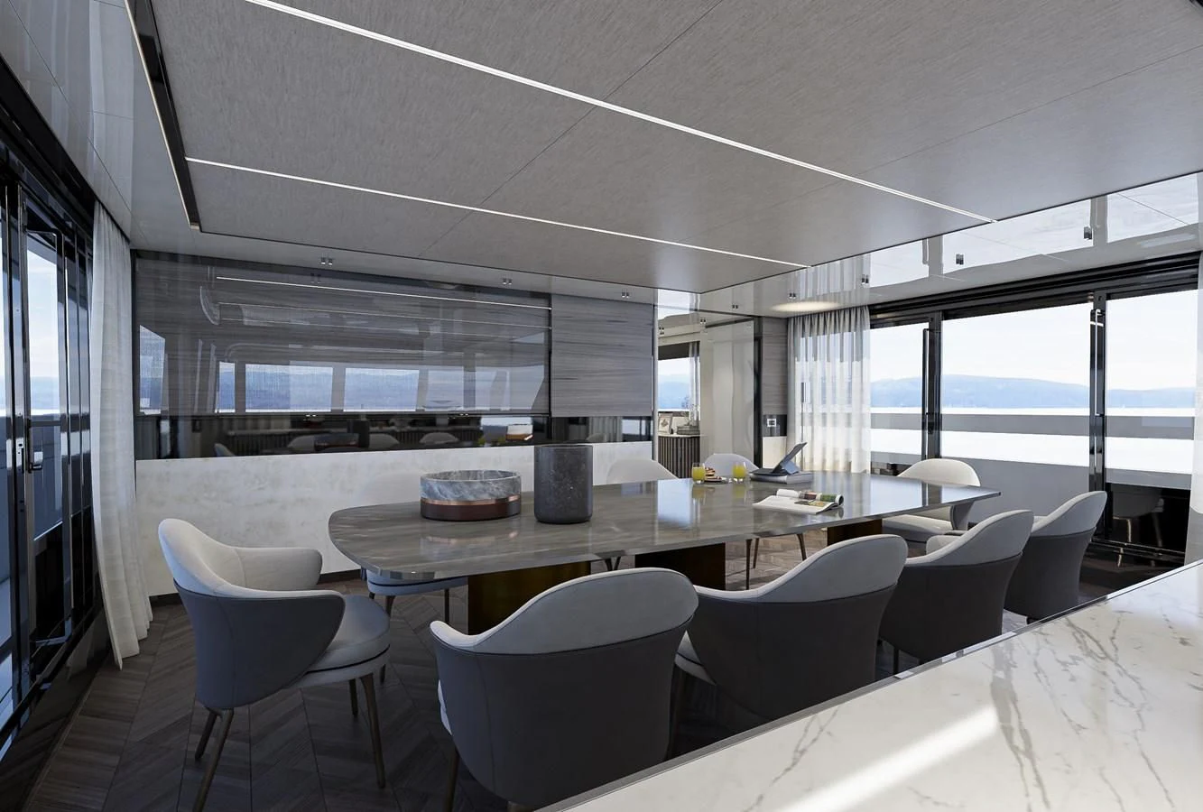 a room with tables and chairs aboard X96 TRIPLEX HULL.4 Yacht for Sale