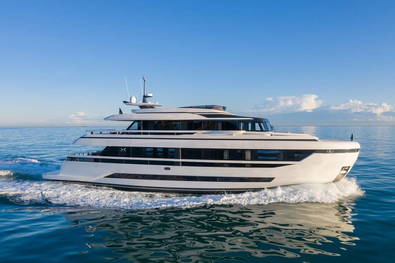 a white boat on the water aboard X96 TRIPLEX HULL.4 Yacht for Sale