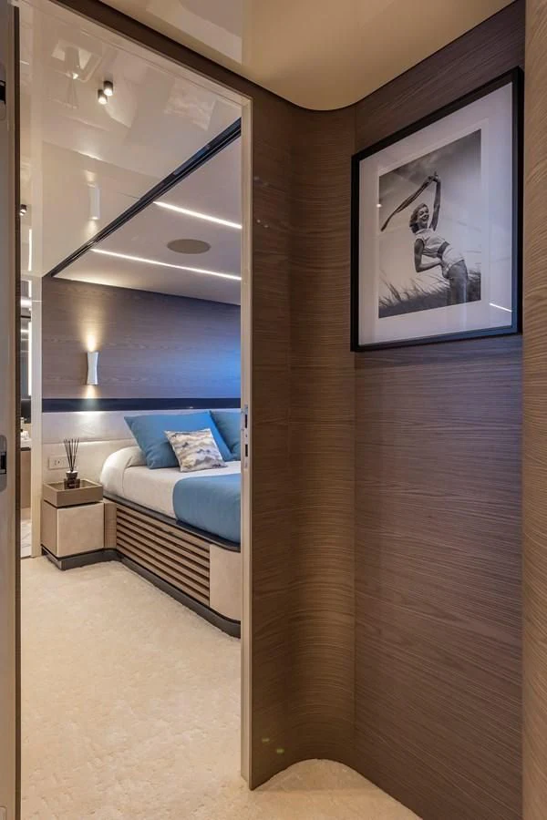 a room with a bed and a mirror aboard X96 TRIPLEX HULL.4 Yacht for Sale