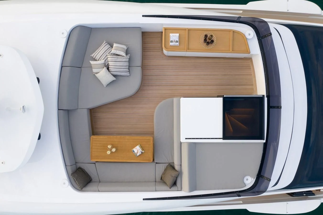 a small wooden desk with a computer aboard X96 TRIPLEX HULL.4 Yacht for Sale