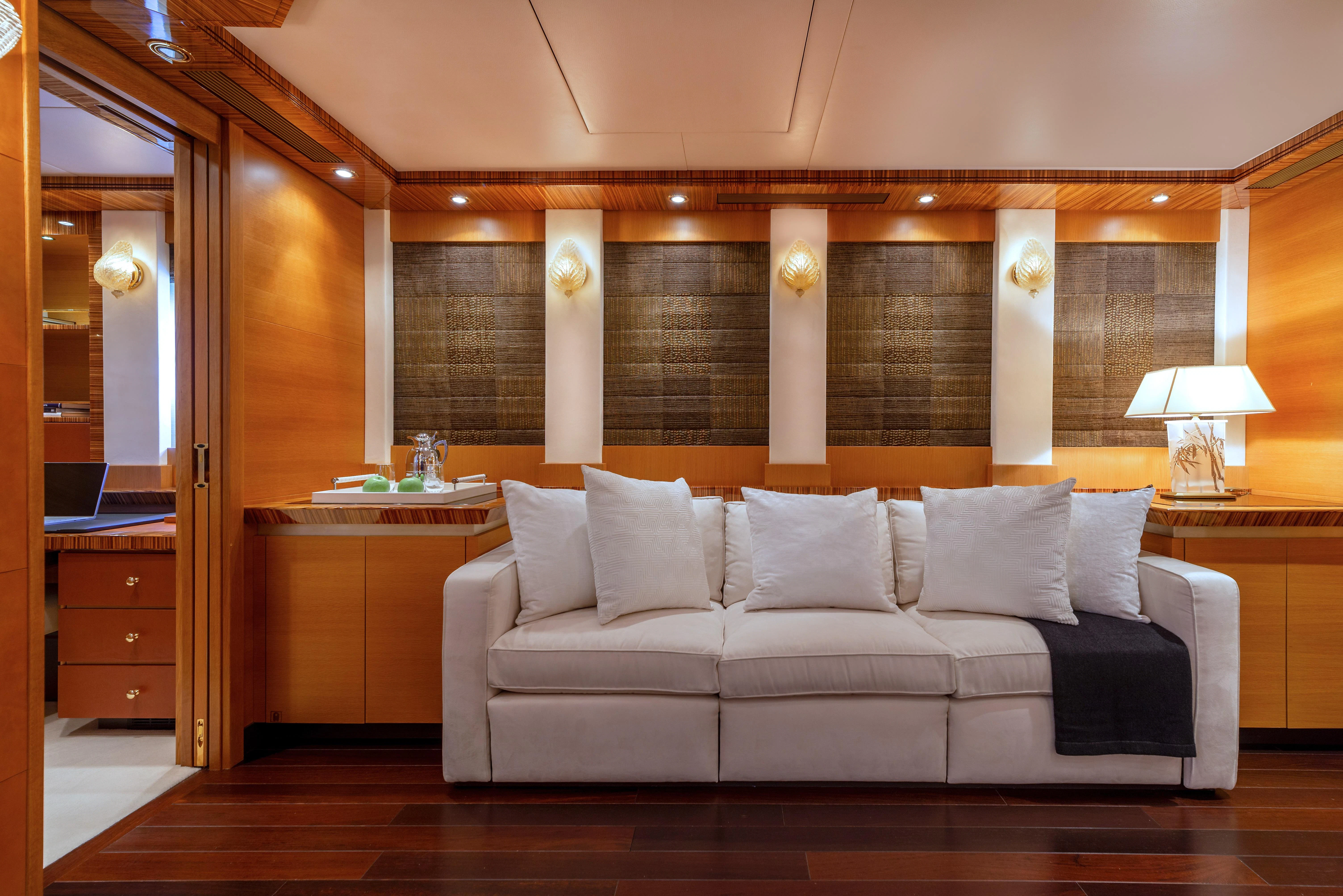 a bed in a room aboard HOKULANI Yacht for Sale
