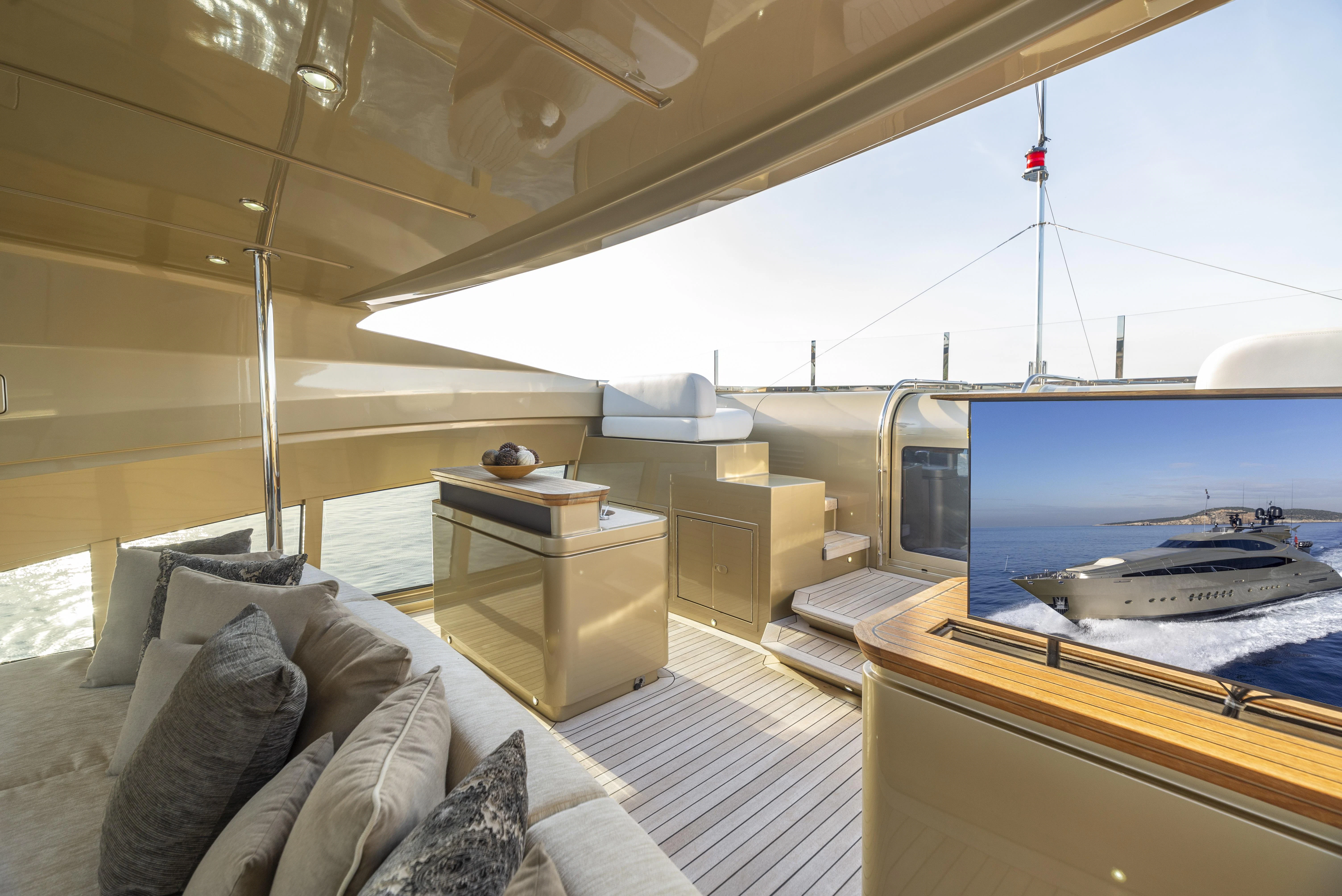 a room with a bed and a desk aboard HOKULANI Yacht for Sale