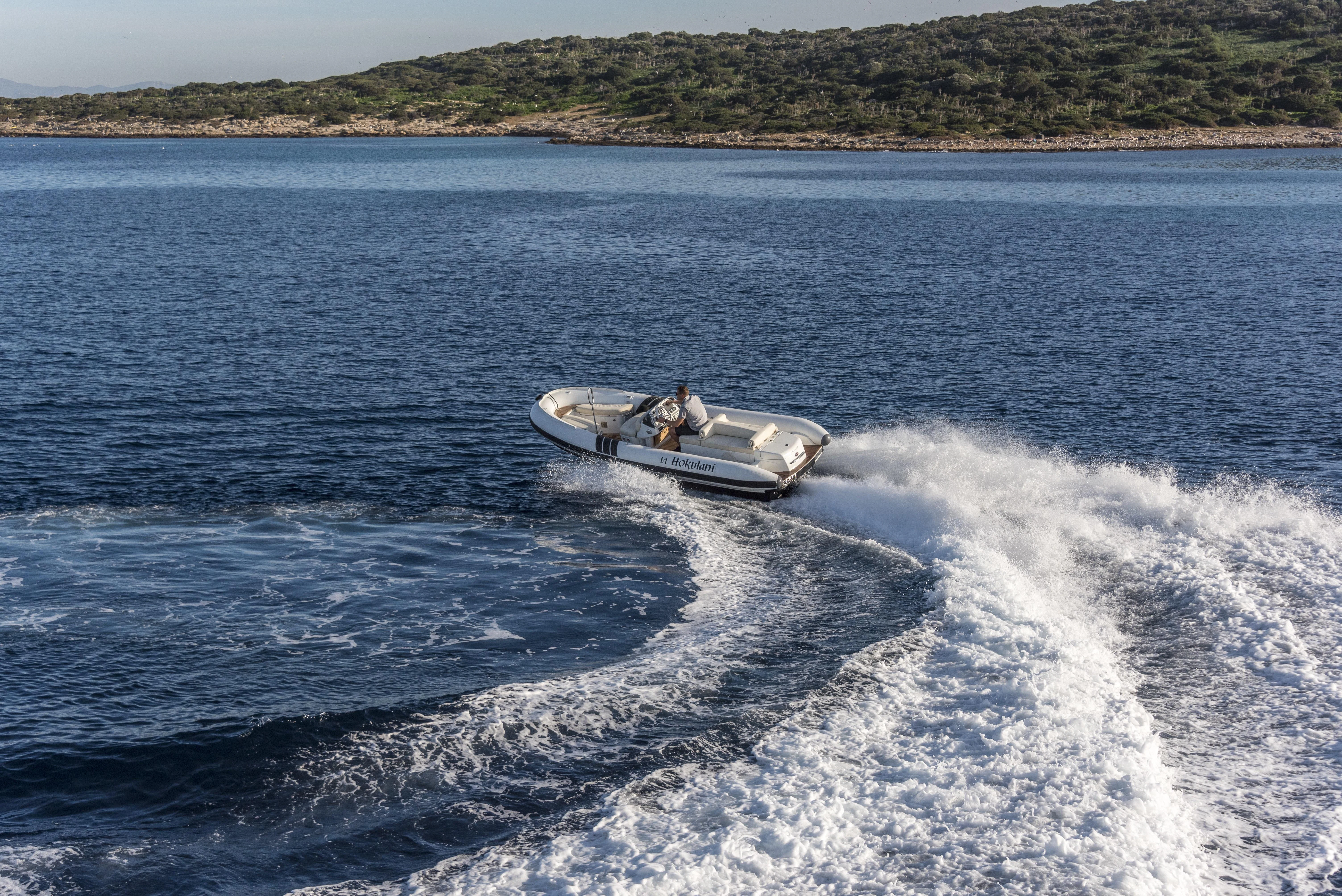 a person on a jet ski aboard HOKULANI Yacht for Sale