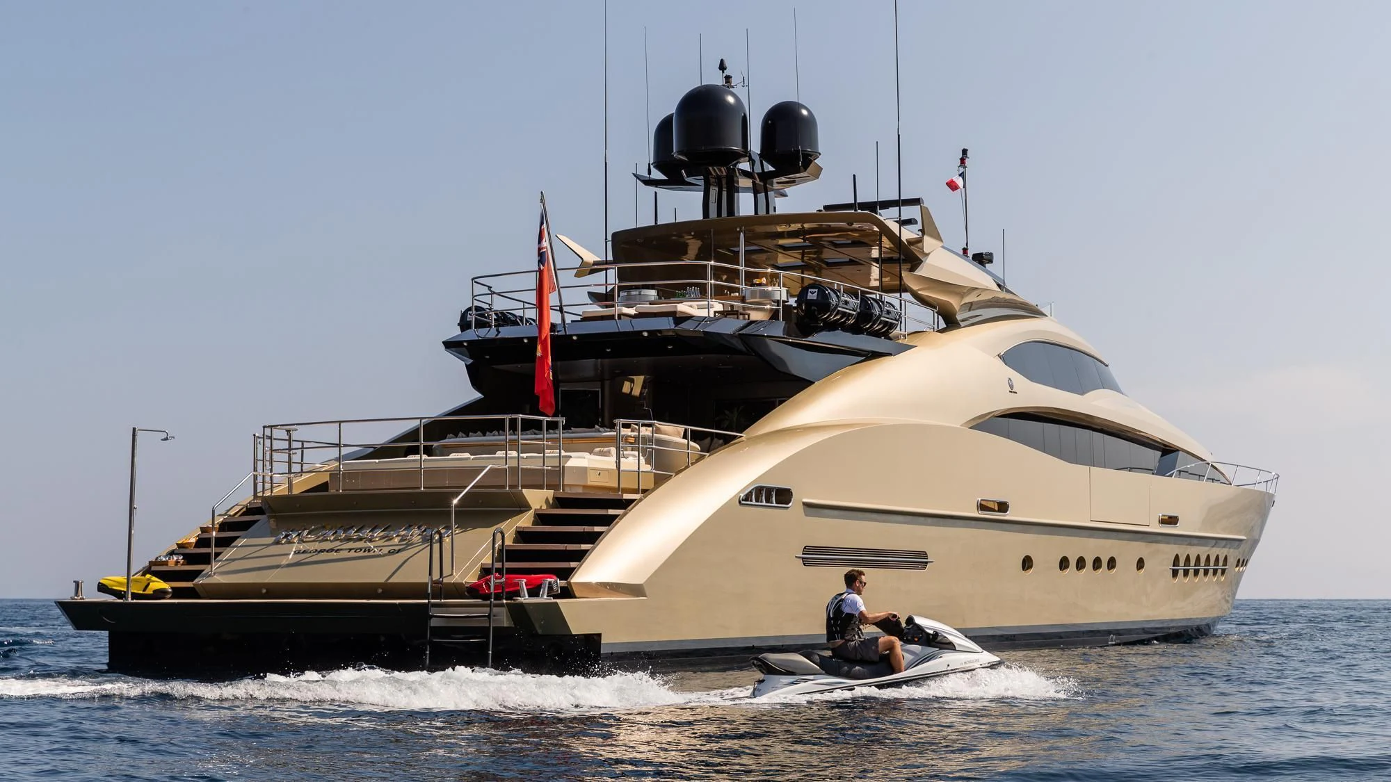 a large boat in the water aboard HOKULANI Yacht for Sale