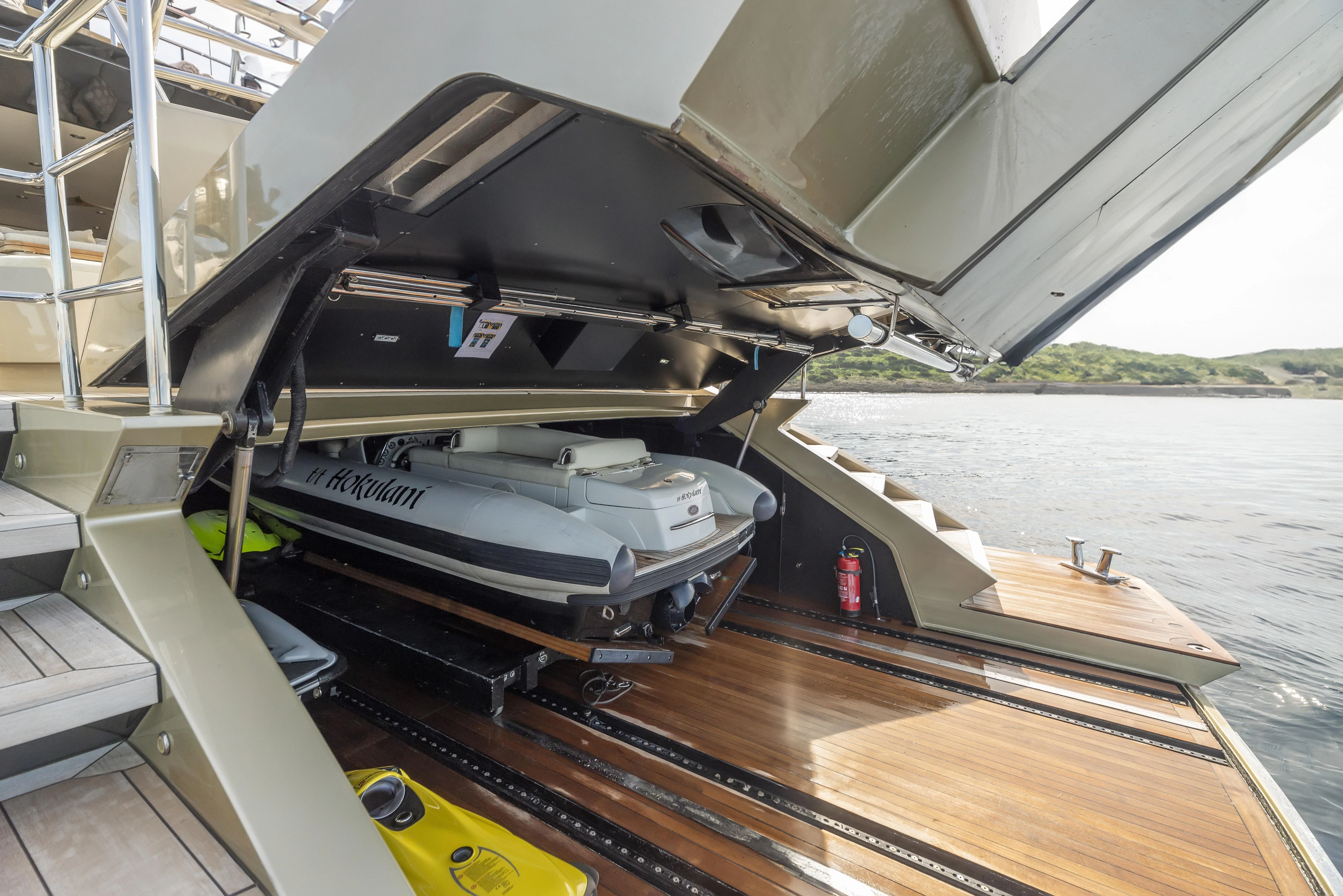 a boat on a deck aboard HOKULANI Yacht for Sale