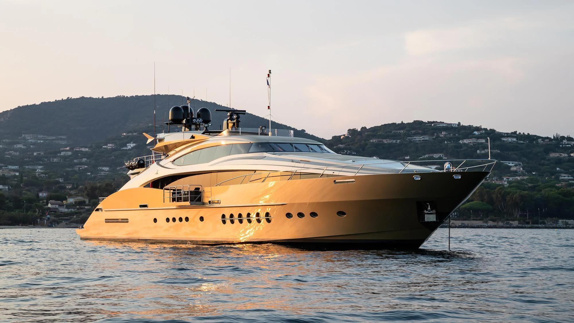 a large boat in the water aboard HOKULANI Yacht for Sale