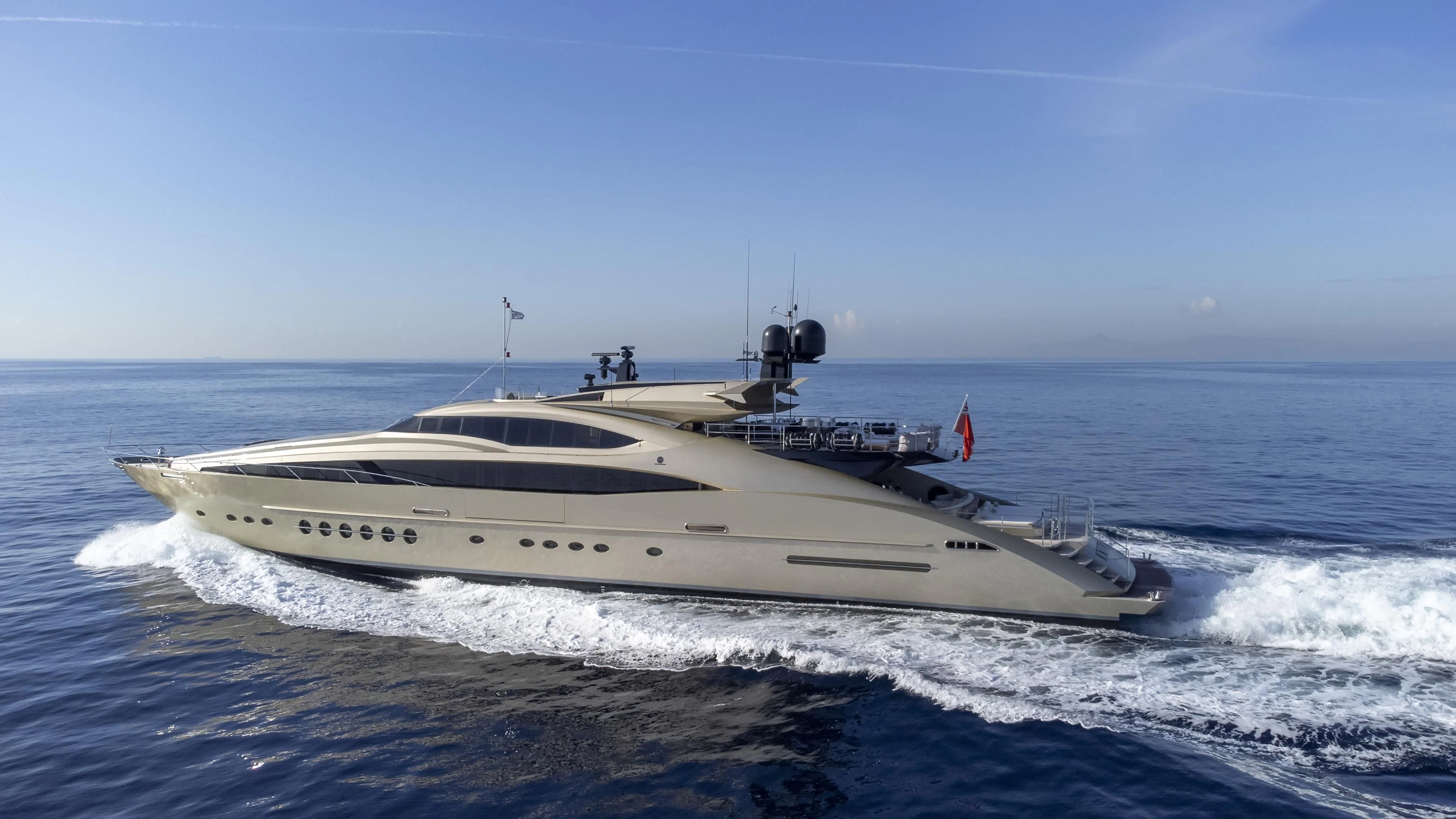 a white yacht on the water aboard HOKULANI Yacht for Sale