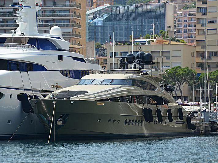 a couple of boats are parked in the water aboard HOKULANI Yacht for Sale
