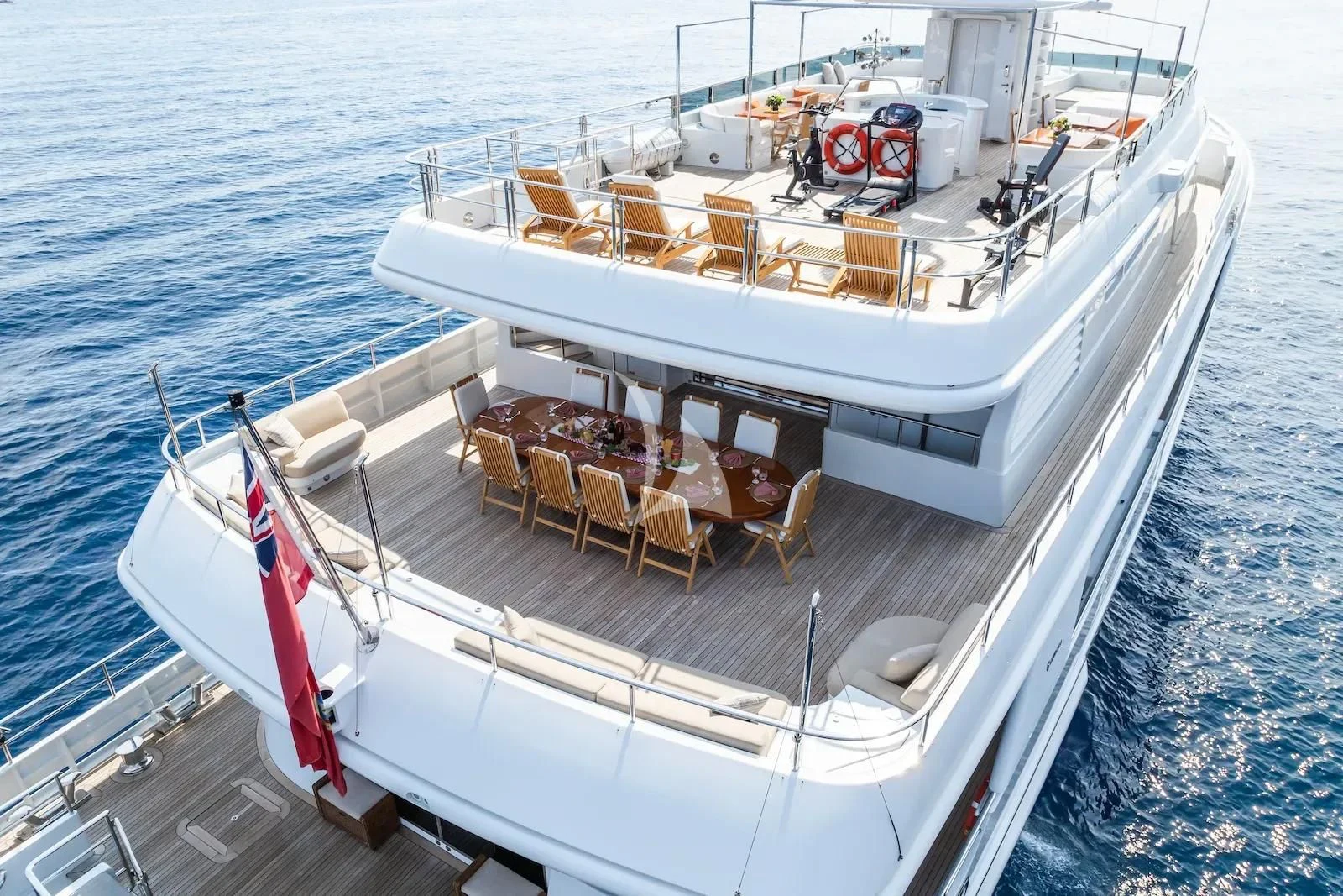 a boat with chairs on the deck aboard TE MANU Yacht for Charter