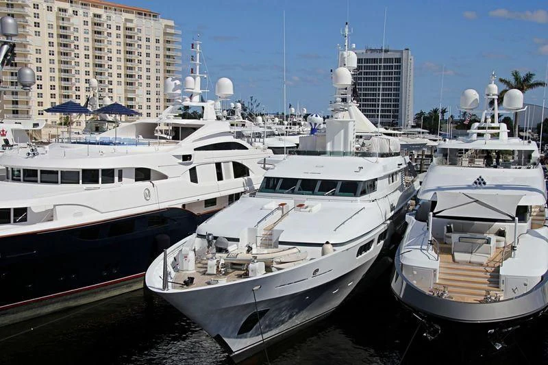 several boats in a harbor aboard TE MANU Yacht for Charter